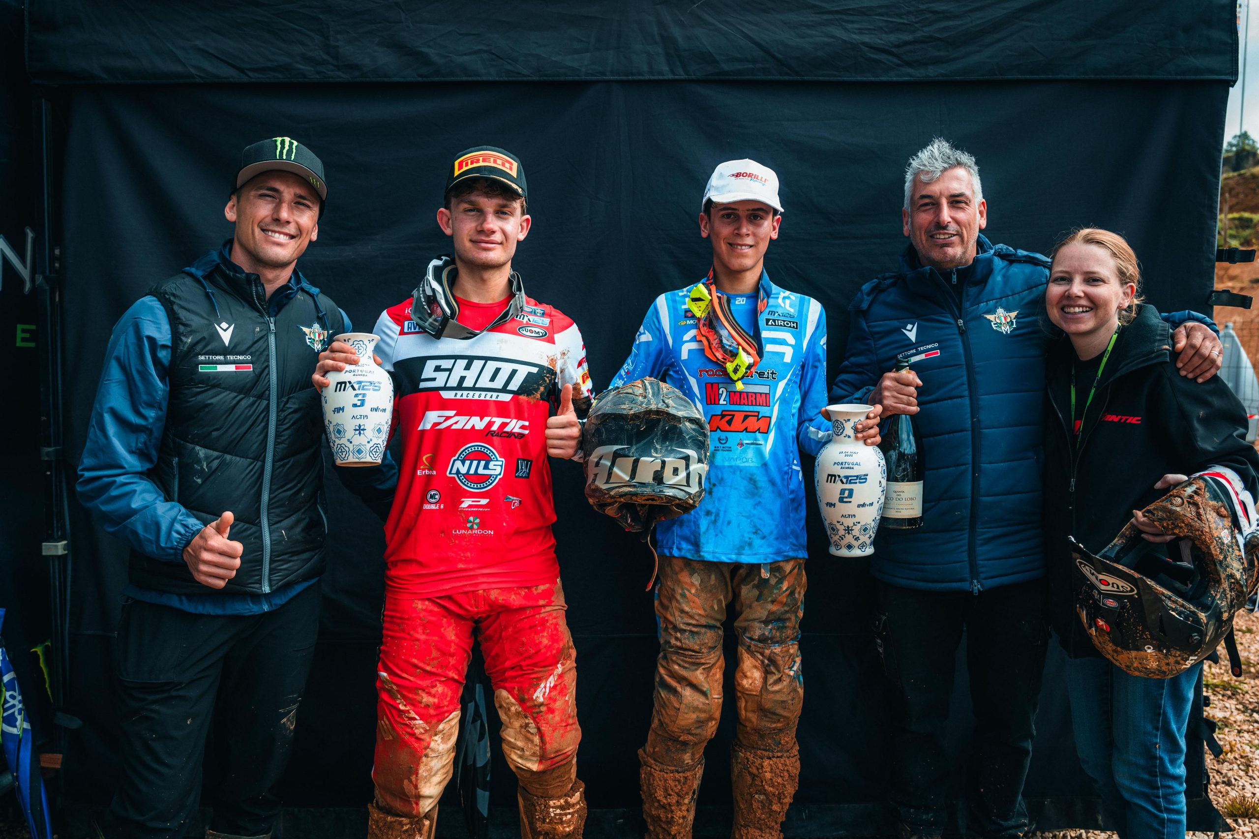 Alessandro Lupino con Bellei, Alvisi e Cristian Beggi dopo il podio del GP del Portogallo